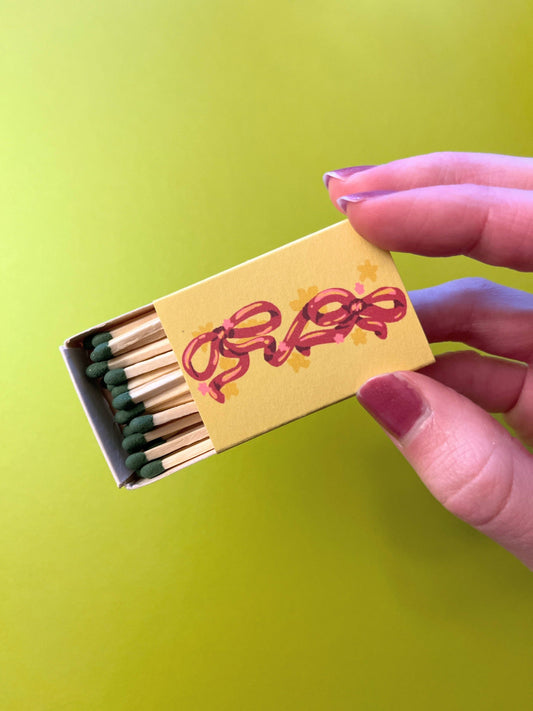 Sure Fire Studio - Wrapped in a Bow Matchbox